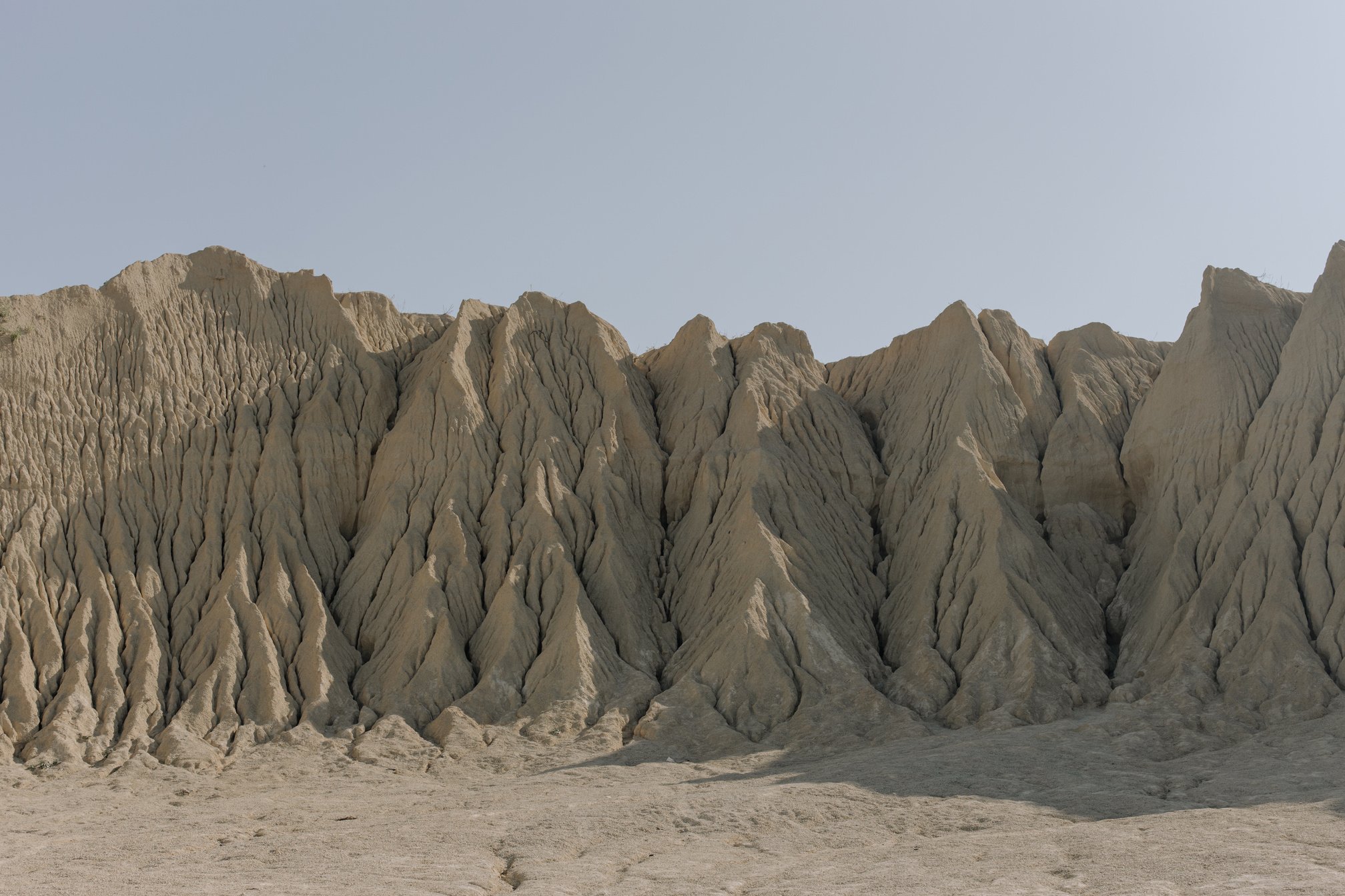 Brown Rock Formation Under Blue Sky